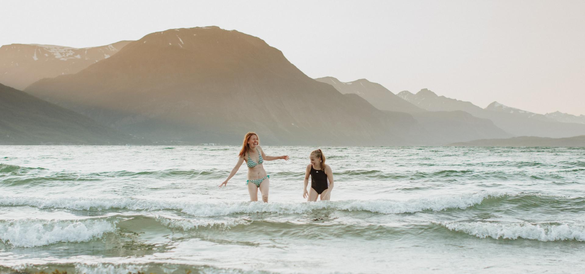 two girls swimming