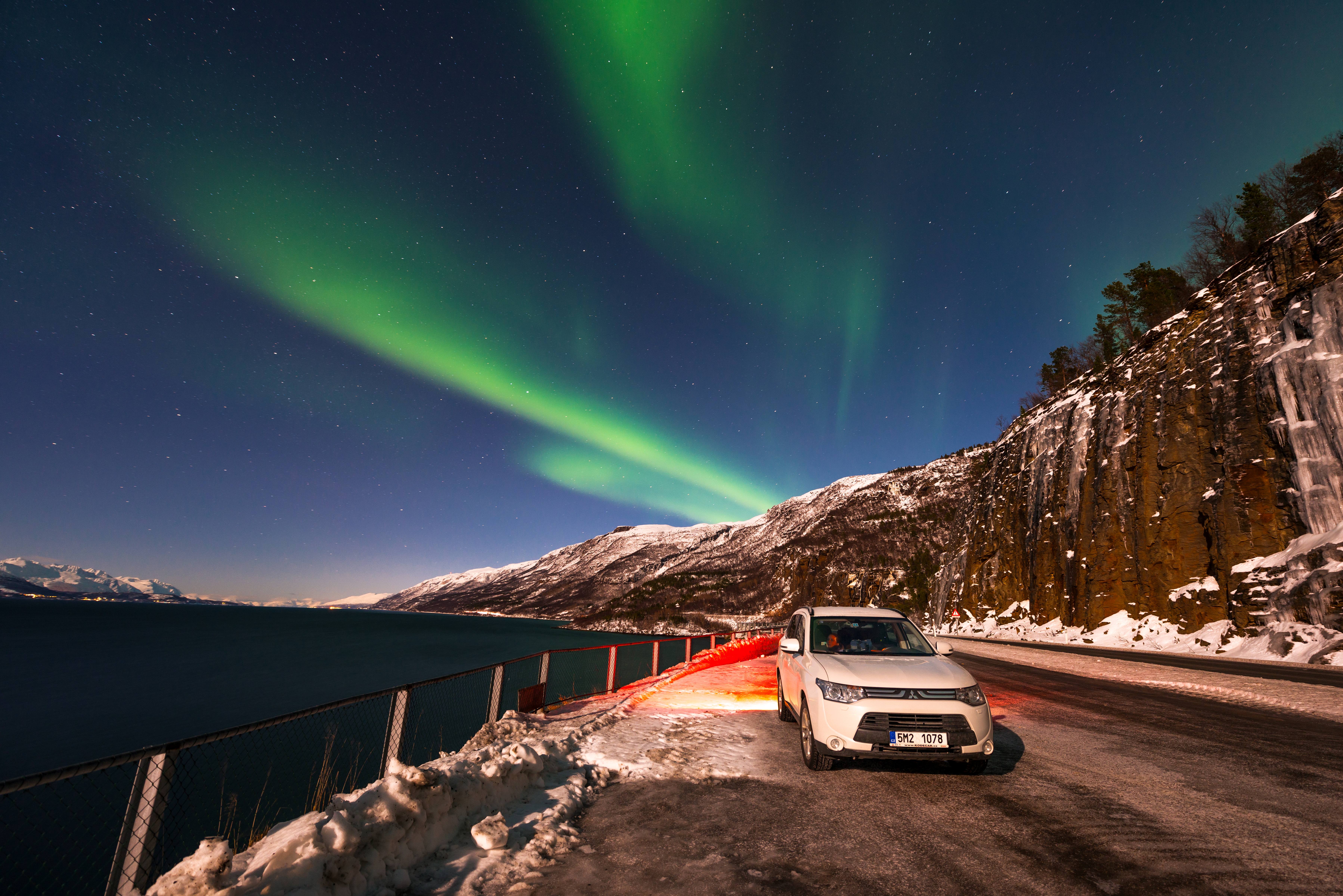 car and northern lights