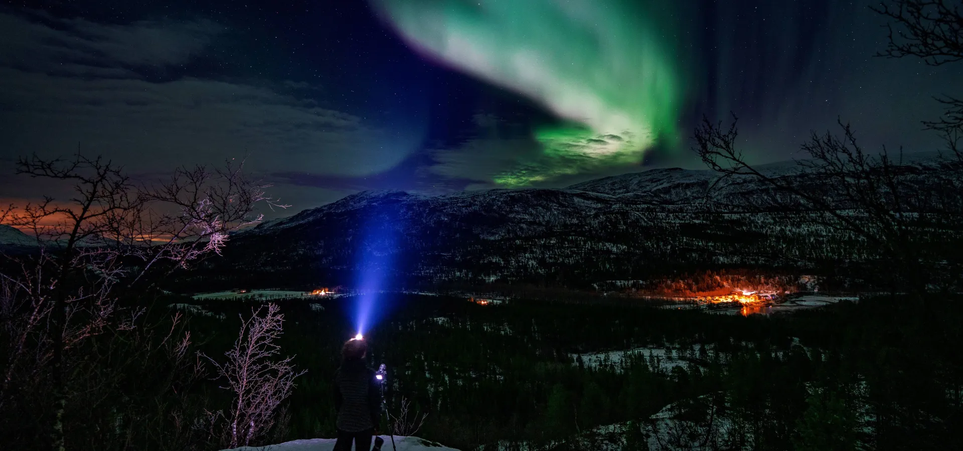 Snowshoeing aurora borealis