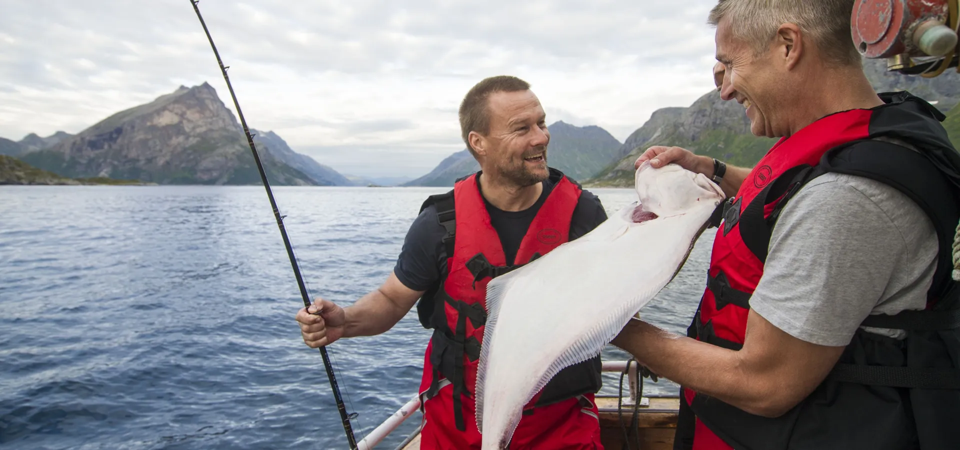 Two fishers caught a halibut